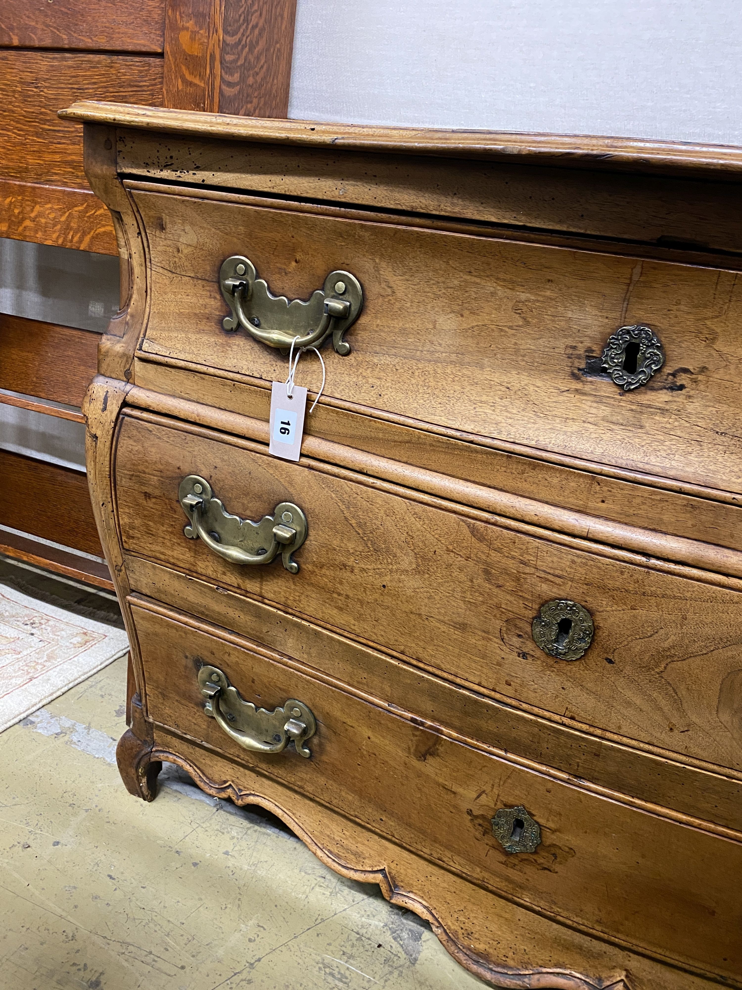 An 18th century Dutch serpentine walnut commode, width 117cm, depth 63cm, height 81cm